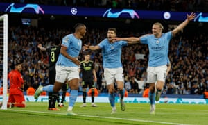 Manuel Akanji, Rodri and Erling Haaland celebrate City's third goal.